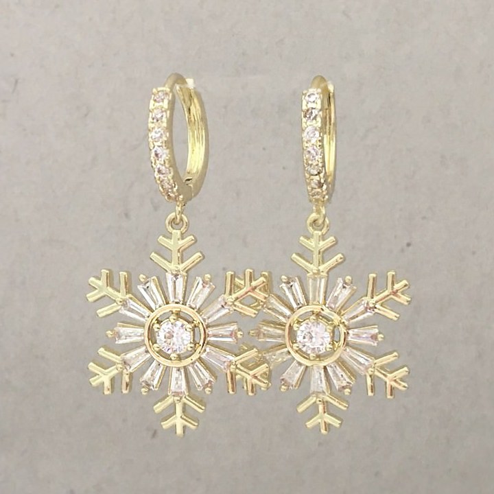 snowflake christmas earrings with sparkling rhinestones and gold tone finish
