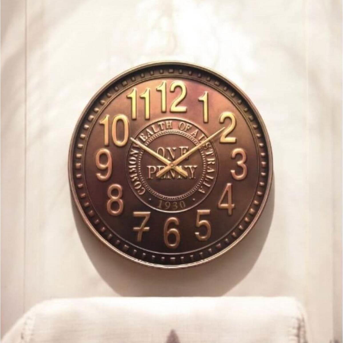 Bronzed metal wall clock of Australian one penny