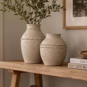 terracotta ceramic pot with beaded design and neutral finish. 2 sizes available