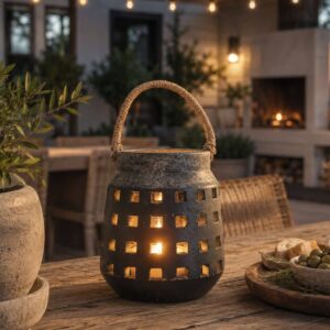 Matte black ceramic lantern with cut out details and rope handle