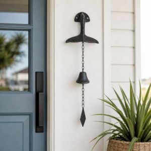 cast iron whale tail wall bell and chime