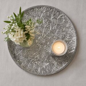 large round metal tray with intricate detailing. 61cm diamter