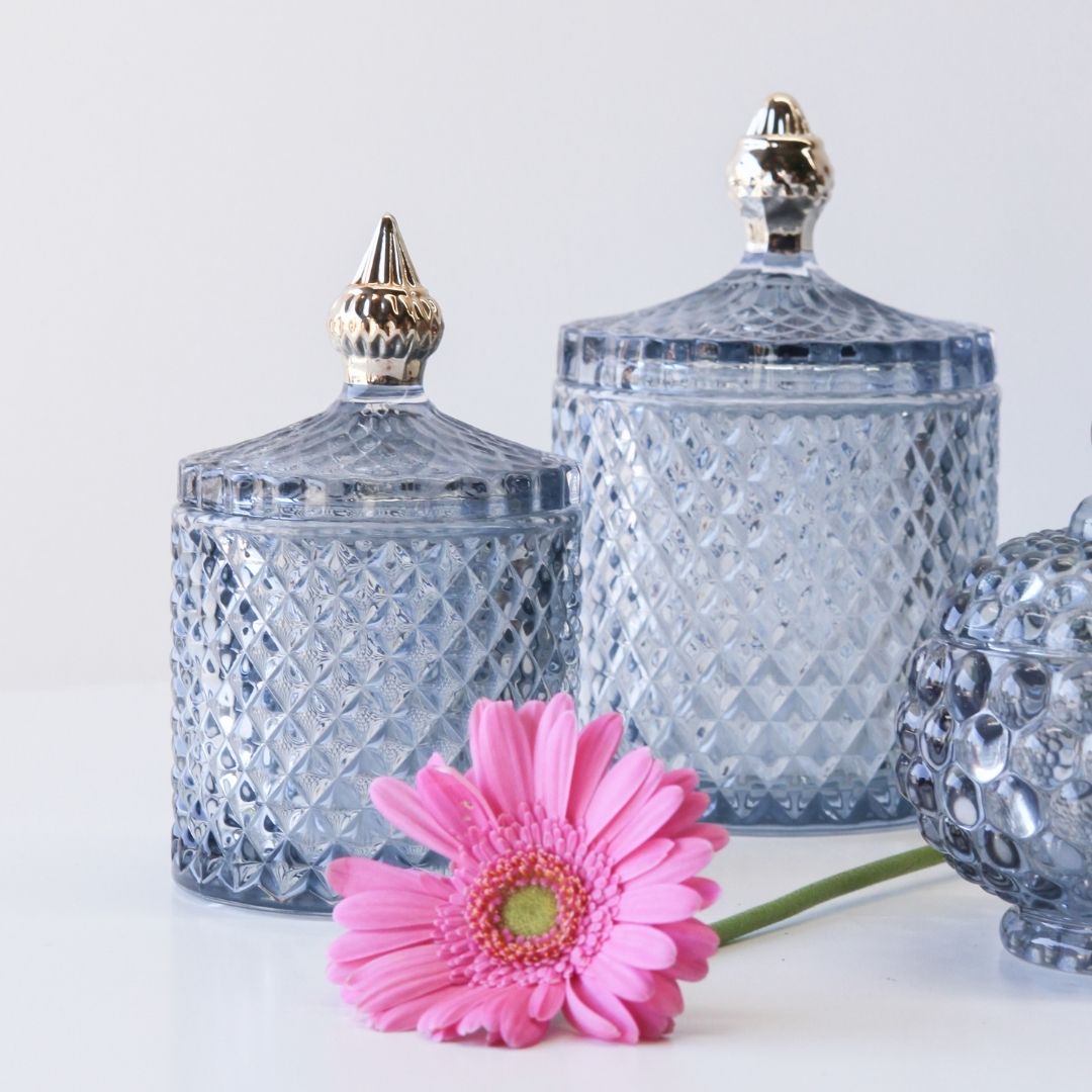 set of 2 decorative blue glass jars and lids with gold finish
