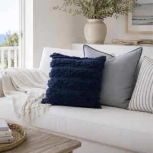 45cm square navy tufted cotton cushion