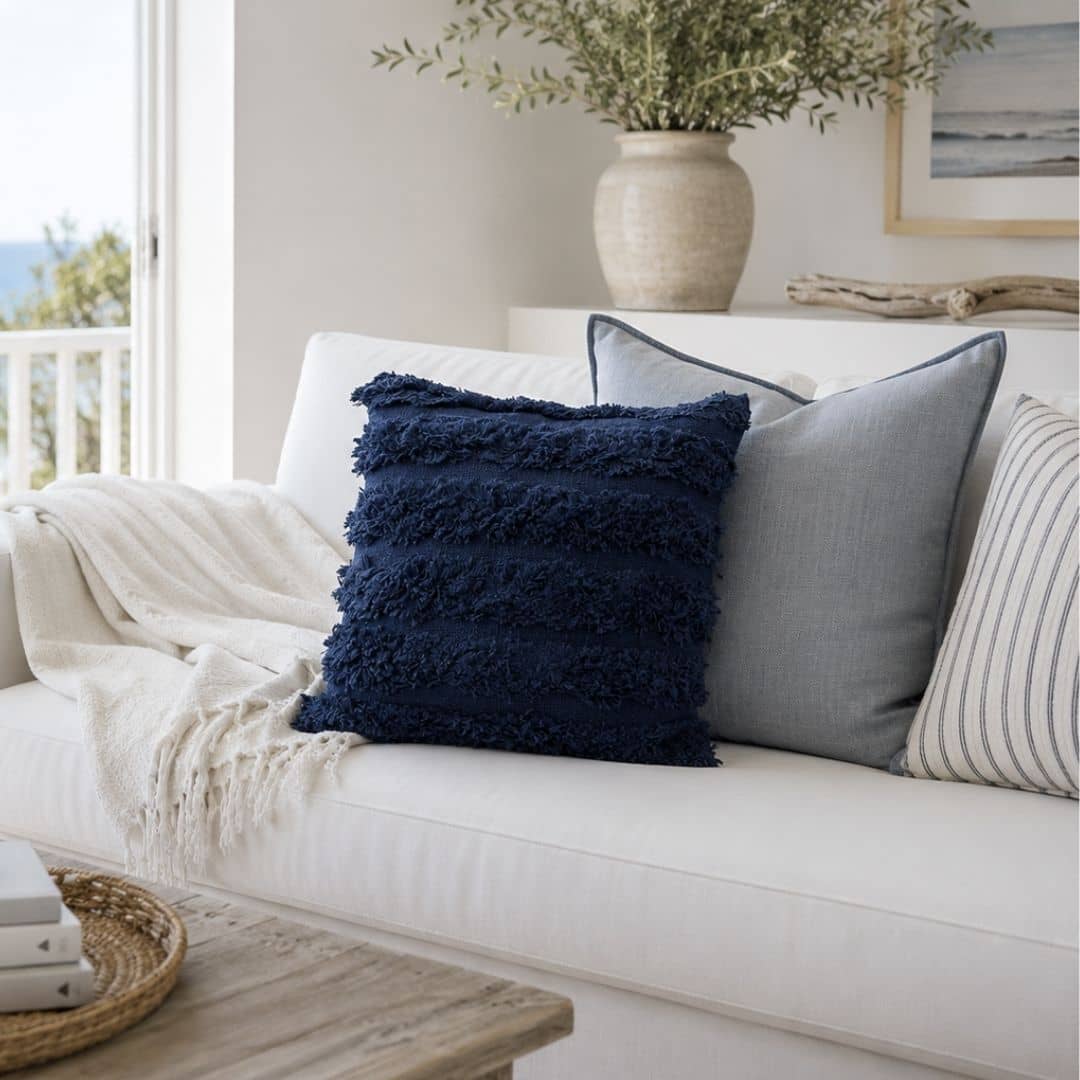 45cm square navy tufted cotton cushion